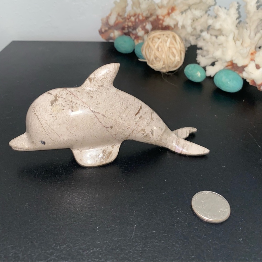 Stone dolphin paperweight